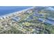 Aerial view showing home's location near the beach at 110 Ponce Terrace Cir, Ponce Inlet, FL 32127