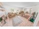Open living room showcasing a fireplace and comfortable seating area at 110 Ponce Terrace Cir, Ponce Inlet, FL 32127