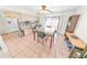 Eat-in kitchen with granite countertops and ample cabinet space at 110 Ponce Terrace Cir, Ponce Inlet, FL 32127