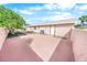 Small backyard with paved patio and some landscaping at 110 Ponce Terrace Cir, Ponce Inlet, FL 32127