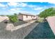 Landscaped backyard with paved walkways and mulch at 110 Ponce Terrace Cir, Ponce Inlet, FL 32127