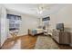 Cozy bedroom with hardwood floors and ample natural light at 2681 Sweet Magnolia Pl, Oviedo, FL 32765