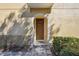 Inviting front door entrance with a wreath and a brick walkway at 2681 Sweet Magnolia Pl, Oviedo, FL 32765