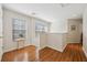 Bright hallway with hardwood floors and natural light at 2681 Sweet Magnolia Pl, Oviedo, FL 32765