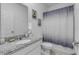 Clean bathroom with shower and granite countertop at 2820 Neverland Dr, New Smyrna Beach, FL 32168