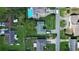 Aerial view of residential neighborhood showing homes, yards, and pools at 3218 Royal Palm Dr, Edgewater, FL 32141