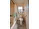 Clean bathroom with shower/tub combo and updated flooring at 3218 Royal Palm Dr, Edgewater, FL 32141
