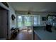 Kitchen with breakfast nook and view of the backyard at 3218 Royal Palm Dr, Edgewater, FL 32141