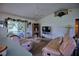 Living room with comfortable seating and plenty of natural light at 3218 Royal Palm Dr, Edgewater, FL 32141