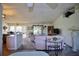 Bright and airy living room with comfortable seating and views of the backyard at 3218 Royal Palm Dr, Edgewater, FL 32141