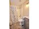 Updated bathroom with double vanity and neutral colors at 3218 Royal Palm Dr, Edgewater, FL 32141