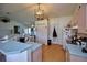 Kitchen with light wood cabinets and a breakfast bar at 3218 Royal Palm Dr, Edgewater, FL 32141