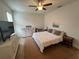 Large bedroom with a king-size bed and dresser at 3325 Pintello Ave, New Smyrna Beach, FL 32168