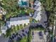Aerial view of residential complex with pool and parking at 4017 Saxon Dr, New Smyrna Beach, FL 32169