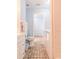 Bathroom with toilet, vanity, and laundry area access at 4017 Saxon Dr, New Smyrna Beach, FL 32169