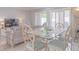 Casual dining area with glass-top table and comfortable seating at 4017 Saxon Dr, New Smyrna Beach, FL 32169