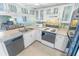 Clean and efficient kitchen with ample storage and countertop space at 4590 S Atlantic Ave # 263, Ponce Inlet, FL 32127