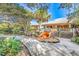 Community center with large seashell and benches at 4590 S Atlantic Ave # 263, Ponce Inlet, FL 32127