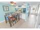 Casual dining area with kitchen pass-through at 4590 S Atlantic Ave # 263, Ponce Inlet, FL 32127