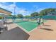 Four pickleball courts with players at 4590 S Atlantic Ave # 263, Ponce Inlet, FL 32127