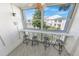 Relaxing balcony with seating, offering a view of the community at 4590 S Atlantic Ave # 263, Ponce Inlet, FL 32127