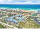 Aerial view showing proximity to beach and community pool at 4590 S Atlantic Ave # 263, Ponce Inlet, FL 32127
