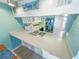 Updated kitchen with white cabinets and stainless steel appliances at 4590 S Atlantic Ave # 263, Ponce Inlet, FL 32127