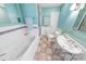 Clean bathroom with a bathtub, shower, and updated vanity at 4590 S Atlantic Ave # 263, Ponce Inlet, FL 32127