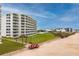 Oceanfront property showcasing building and beachfront access at 5201 S Atlantic Ave # 809A, New Smyrna Beach, FL 32169