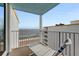 Relaxing balcony with ocean view and lounge chair at 5201 S Atlantic Ave # 809A, New Smyrna Beach, FL 32169