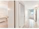 Entryway with tile flooring and access to bedroom and balcony at 5201 S Atlantic Ave # 809A, New Smyrna Beach, FL 32169