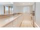 White kitchen with stainless steel appliances at 5201 S Atlantic Ave # 809A, New Smyrna Beach, FL 32169