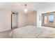 Main bedroom with ocean view and en-suite bathroom at 5201 S Atlantic Ave # 809A, New Smyrna Beach, FL 32169