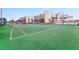 Community tennis court with green surface at 5201 S Atlantic Ave # 809A, New Smyrna Beach, FL 32169