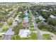 Aerial view showcasing home's location, neighborhood, and proximity to waterways at 624 S Pine St, New Smyrna Beach, FL 32169