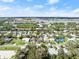 Aerial view showcasing home's location, neighborhood, and proximity to waterways at 624 S Pine St, New Smyrna Beach, FL 32169