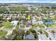 Aerial view showcasing home's location, neighborhood, and proximity to waterways at 624 S Pine St, New Smyrna Beach, FL 32169