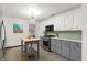 Updated kitchen featuring stainless steel appliances and a kitchen island at 624 S Pine St, New Smyrna Beach, FL 32169
