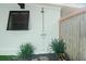 Enjoy an outdoor shower near a bamboo fence at 624 S Pine St, New Smyrna Beach, FL 32169