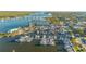 Aerial view of a marina and waterfront property at 663 Wellesley Ct, New Smyrna Beach, FL 32168