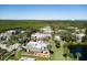 Community view showcasing waterfront location and lush landscape at 114 Cedar Dunes Dr, New Smyrna Beach, FL 32169