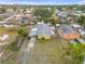 Bird's-eye view of the home, revealing the layout of the property and surrounding area at 130 Indian Creek Rd, Oak Hill, FL 32759