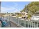 Relaxing balcony with waterfront views, perfect for enjoying the serene surroundings at 130 Indian Creek Rd, Oak Hill, FL 32759