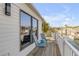 Charming balcony overlooking the tranquil canal, offering a peaceful retreat at 130 Indian Creek Rd, Oak Hill, FL 32759