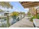 Private dock with boat lift and tranquil water views at 130 Indian Creek Rd, Oak Hill, FL 32759