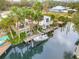 Charming waterfront home with private dock and boat lift at 130 Indian Creek Rd, Oak Hill, FL 32759