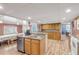 Spacious kitchen with ample counter space, stainless steel appliances, and plenty of cabinets at 130 Indian Creek Rd, Oak Hill, FL 32759