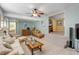 Open living room with split-level layout, offering diverse areas for relaxation at 130 Indian Creek Rd, Oak Hill, FL 32759
