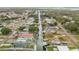 Aerial view of neighborhood with canal access and waterfront properties at 130 Indian Creek Rd, Oak Hill, FL 32759
