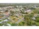 Aerial view showcasing the neighborhood's waterfront location and canal access at 130 Indian Creek Rd, Oak Hill, FL 32759